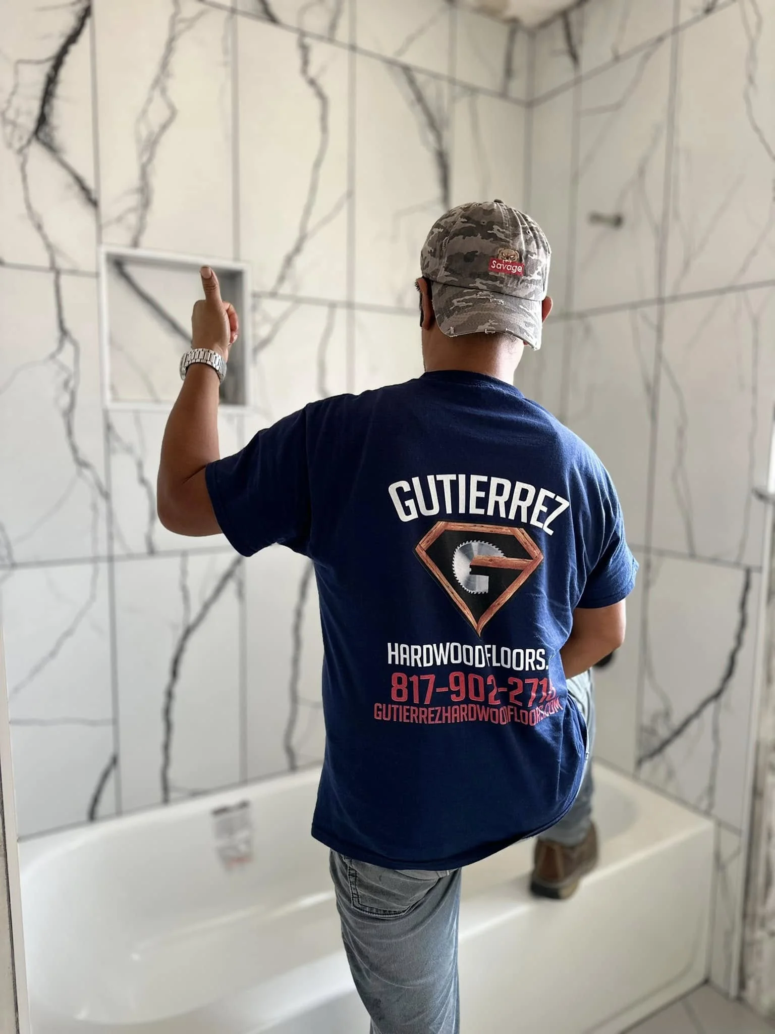Gutierrez craftsman installing shower tile